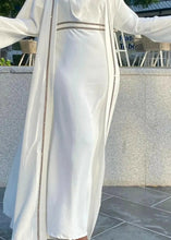 abaya with hijab ,abaya online shopping,modest fashion abaya,buy abaya online,black abaya dress,abaya with hijab set,open abaya kimono,abaya for Eid 2025,luxury abaya collection,sparkling black,abaya for evening wear,velvet abaya with pearl detailing,plus size modest abaya dresses,lightweight summer abaya 2025,bridal white abaya with lace,embroidered abaya for special occasions,modern abaya styles for young women,online abaya shopping in UAE,abaya boutiques near me,designer abaya, monochrome abaya