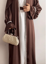 abaya with hijab ,abaya online shopping,modest fashion abaya,buy abaya online,black abaya dress,abaya with hijab set,open abaya kimono,abaya for Eid 2025,luxury abaya collection,sparkling black,abaya for evening wear,velvet abaya with pearl detailing,plus size modest abaya dresses,lightweight summer abaya 2025,bridal white abaya with lace,embroidered abaya for special occasions,modern abaya styles for young women,online abaya shopping in UAE,abaya boutiques near me,designer abaya, monochrome abaya, Dubai st