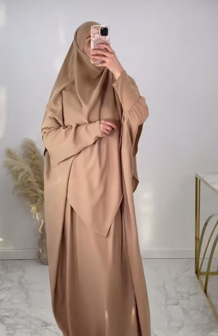 Modest brown abaya with matching khimar set displayed on model, ideal for prayer or everyday wear